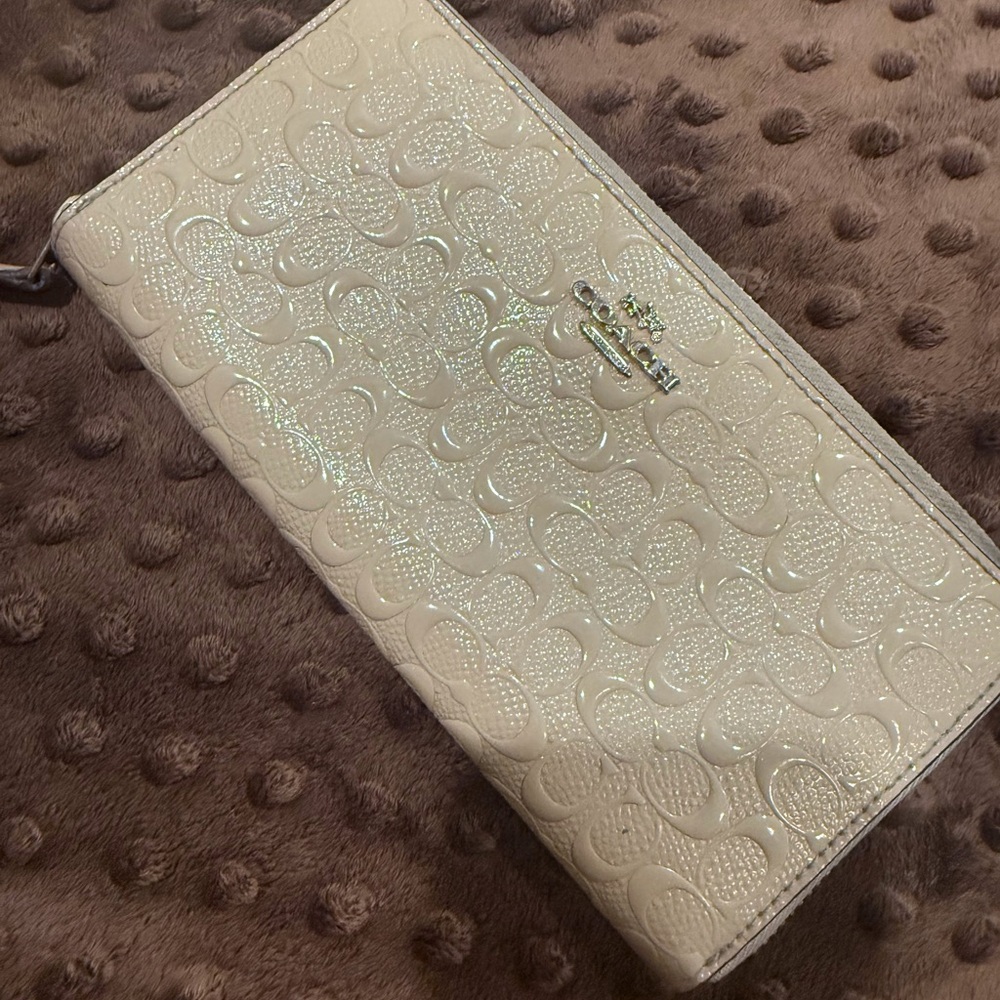 Coach Creamy tan Embossed Wallet